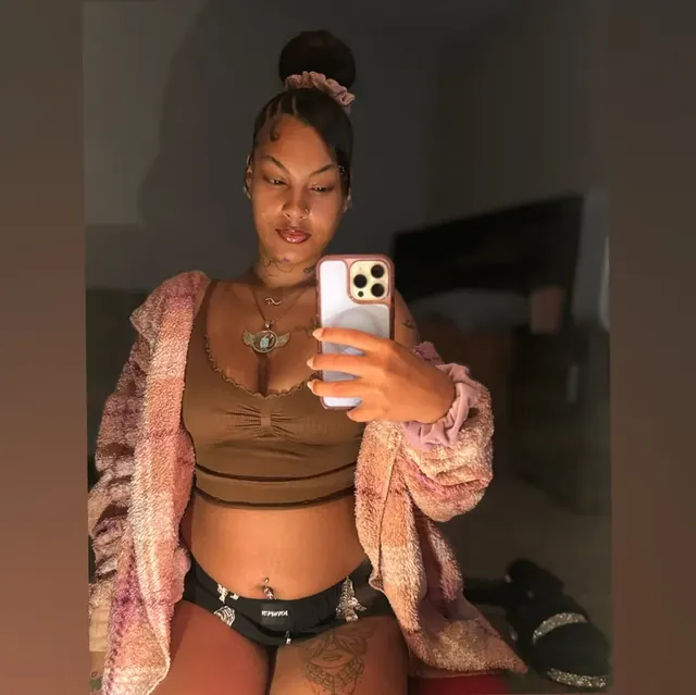 No Caller ID OnlyFans creator with curly hair