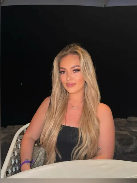 Emily Rain OnlyFans petite blonde creator