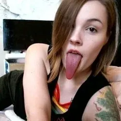 Evie May OnlyFans fetish model with long tongue