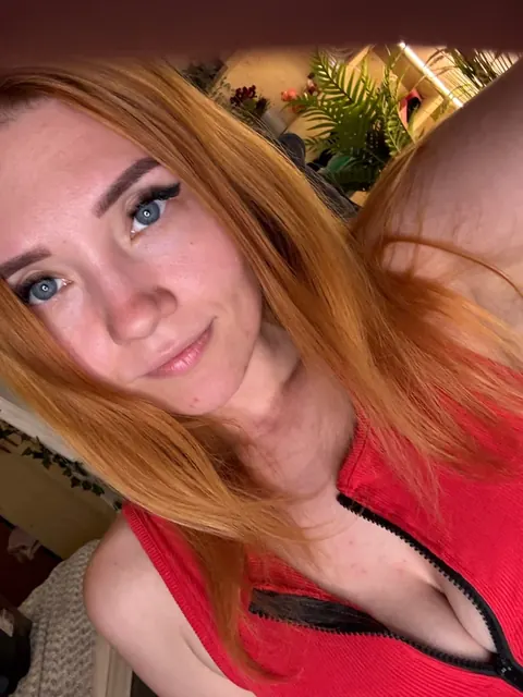 Val OnlyFans profile with red hair