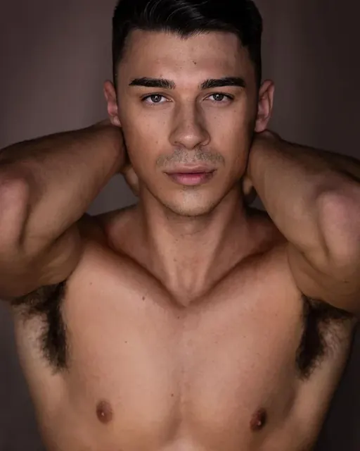 HANDSOME BUCK OnlyFans male model with polished content.