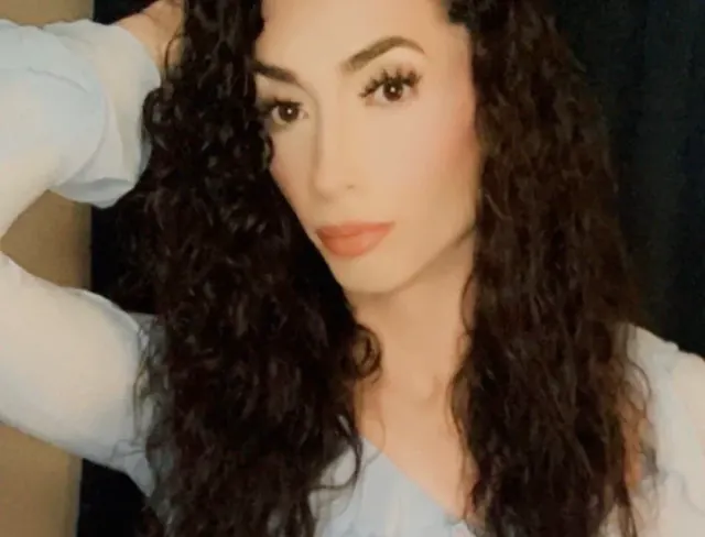 Triniti on OnlyFans with interactive content
