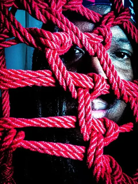 Lion OnlyFans creator showcasing bondage work
