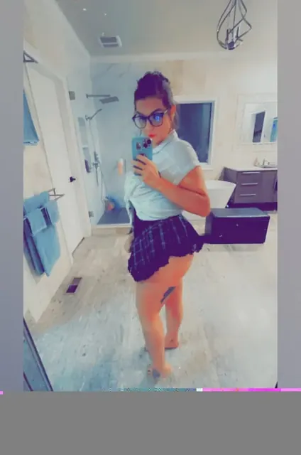 a OnlyFans gamer with tattoos