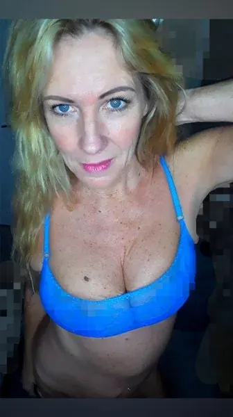 sizzlingscorpiosiren OnlyFans model with long blonde hair
