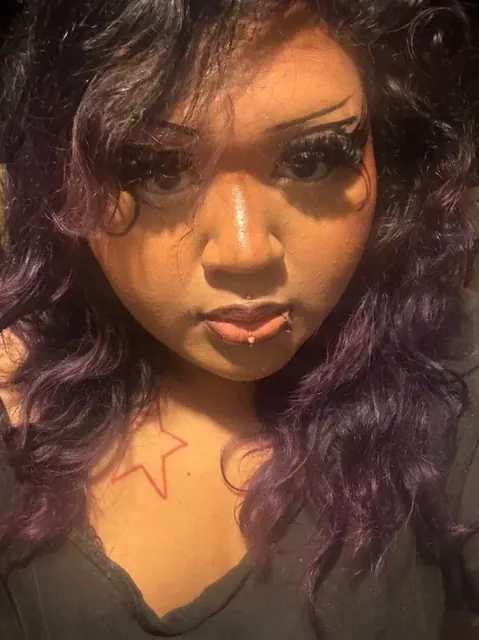 Slvttycryss OnlyFans profile tattooed and pierced star