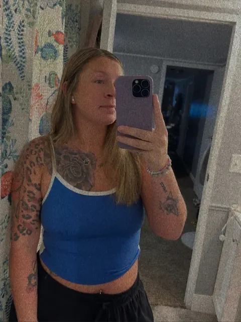 Sunshine OnlyFans creator with tattoos