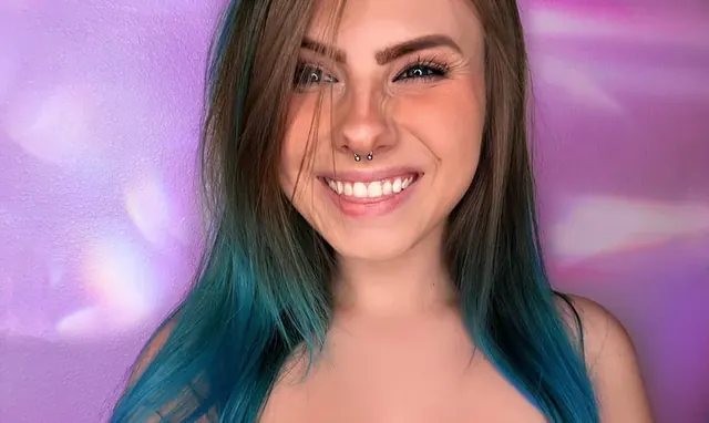 tabs24x7 OnlyFans creator with playful nude content