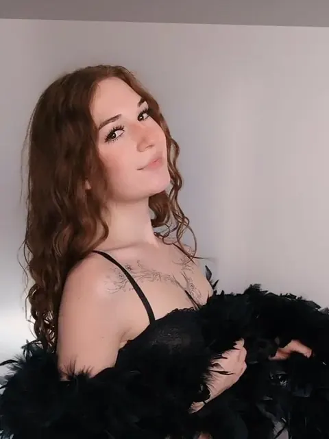 Vella on OnlyFans with auburn hair