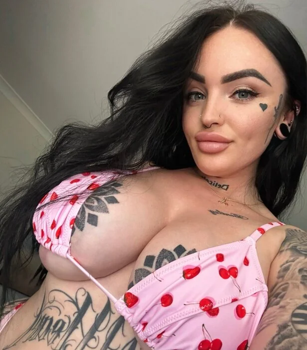 Tattooed brat OnlyFans creator with exclusive content