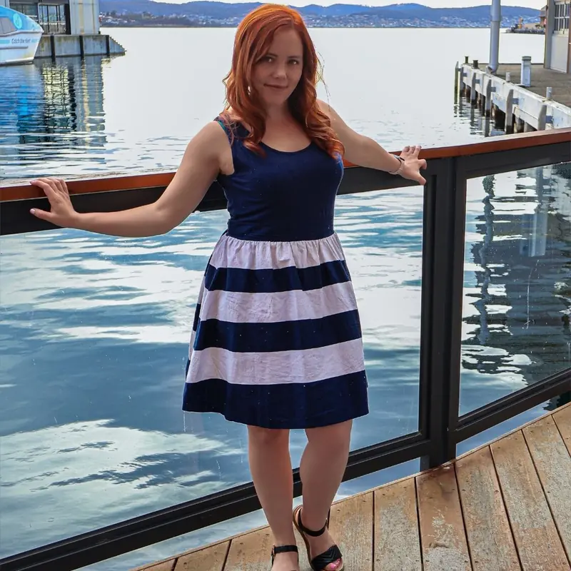 Lipstick Lucy OnlyFans profile with red hair