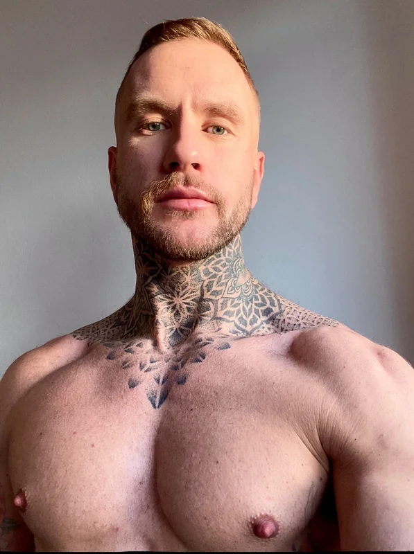 Parker OnlyFans creator with tattoos and beard