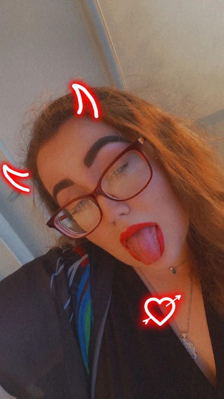 Emi OnlyFans creator with glasses