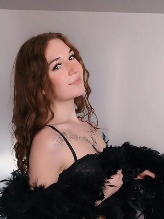 Vella on OnlyFans with auburn hair